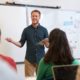 k-12 educator professional development and support grants: male teacher teaching students in classroom