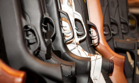 Guns arsenal collection, close-up of guns and their grips