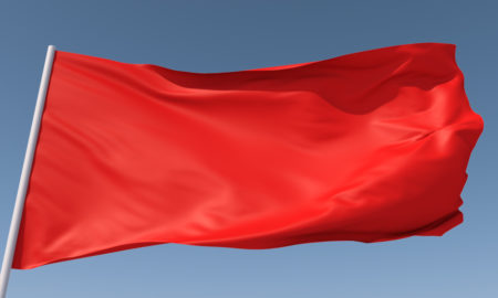 gun violence: Three dimensional floating red flag