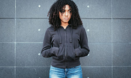 Philadelphia: Sad and lonely teenager portrait in the city street