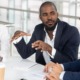 system-involved youth reentry project grants; team of young business people having meeting