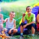 West Michigan child and youth program grants: group of happy kids at campsite