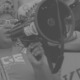 women and girls of color organization grants: black woman with megaphone at rally