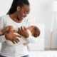 infant mortality, systemic racism, racial disparity grants: happy black mother and baby in white room