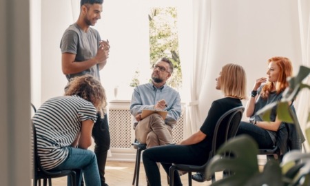 youth substance use/abuse prevention treatment, diversion: group of young people and counselor doing group therapy